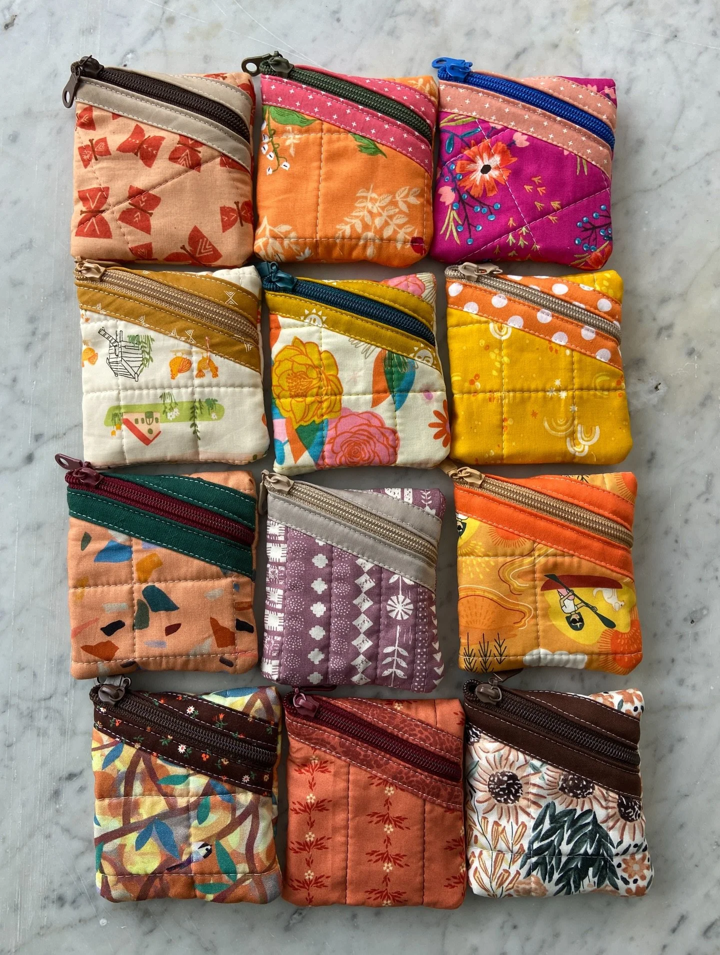 Fun &amp; sustainable little stocking stuffers! These mini pouches are made from the off-cuts of kindle and book/tablet sleeves. They are about 4&rdquo; square and perfect as coin pouches, storing your earbuds or a phone cord, or just a little mini b