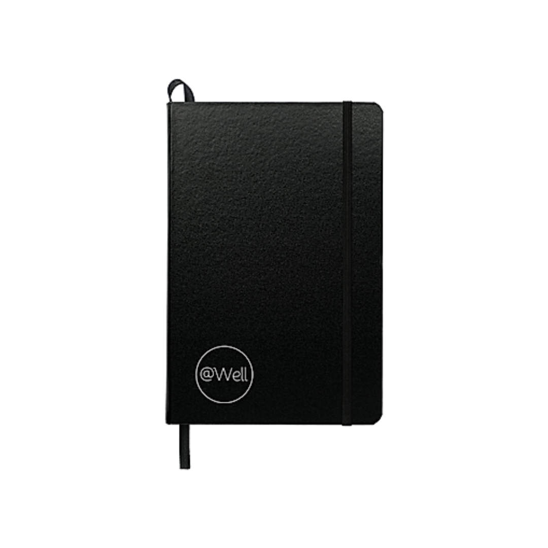 Black Journal with the white @Well logo in the bottom left corner.