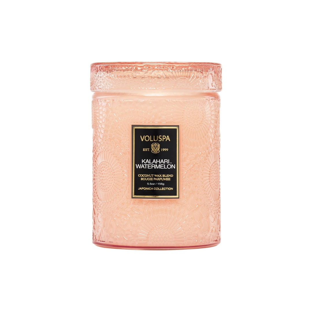 Voluspa Kalahari Watermelon candle in a pink embossed glass jar.