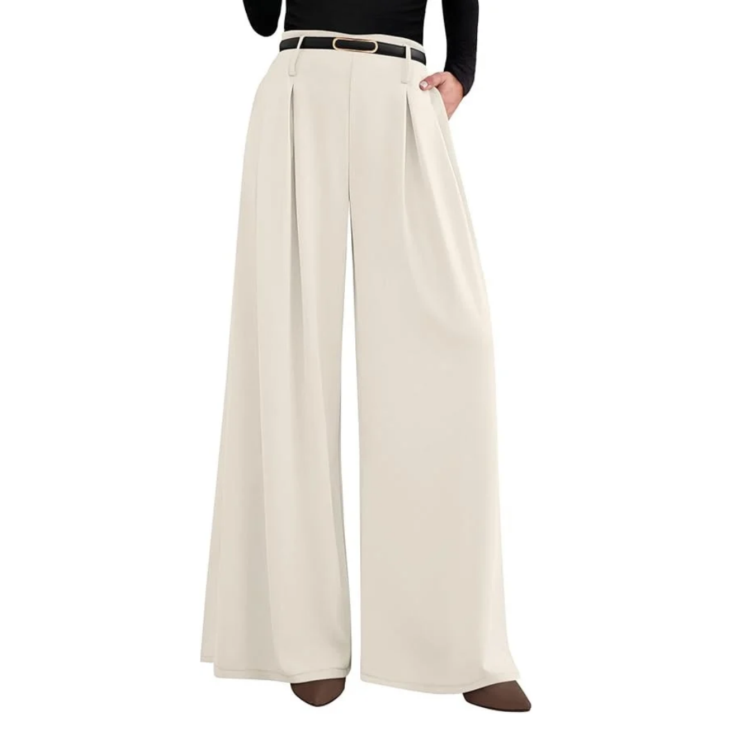 Cream-colored high-waisted, wide-leg pleated trousers styled with a black fitted top and slim black belt.