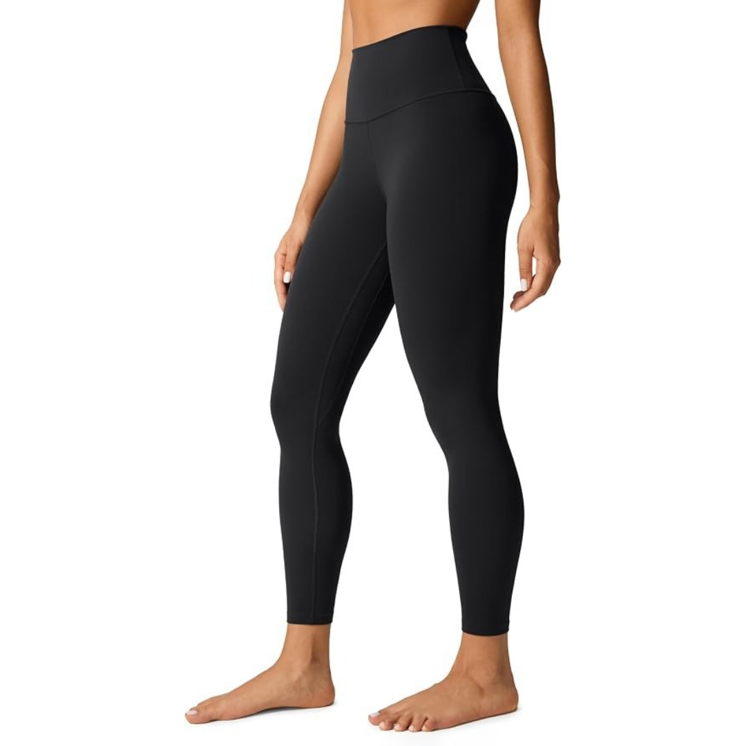 Woman modeling black high-waisted, ankle-length athletic leggings with a wide waistband against a white background.