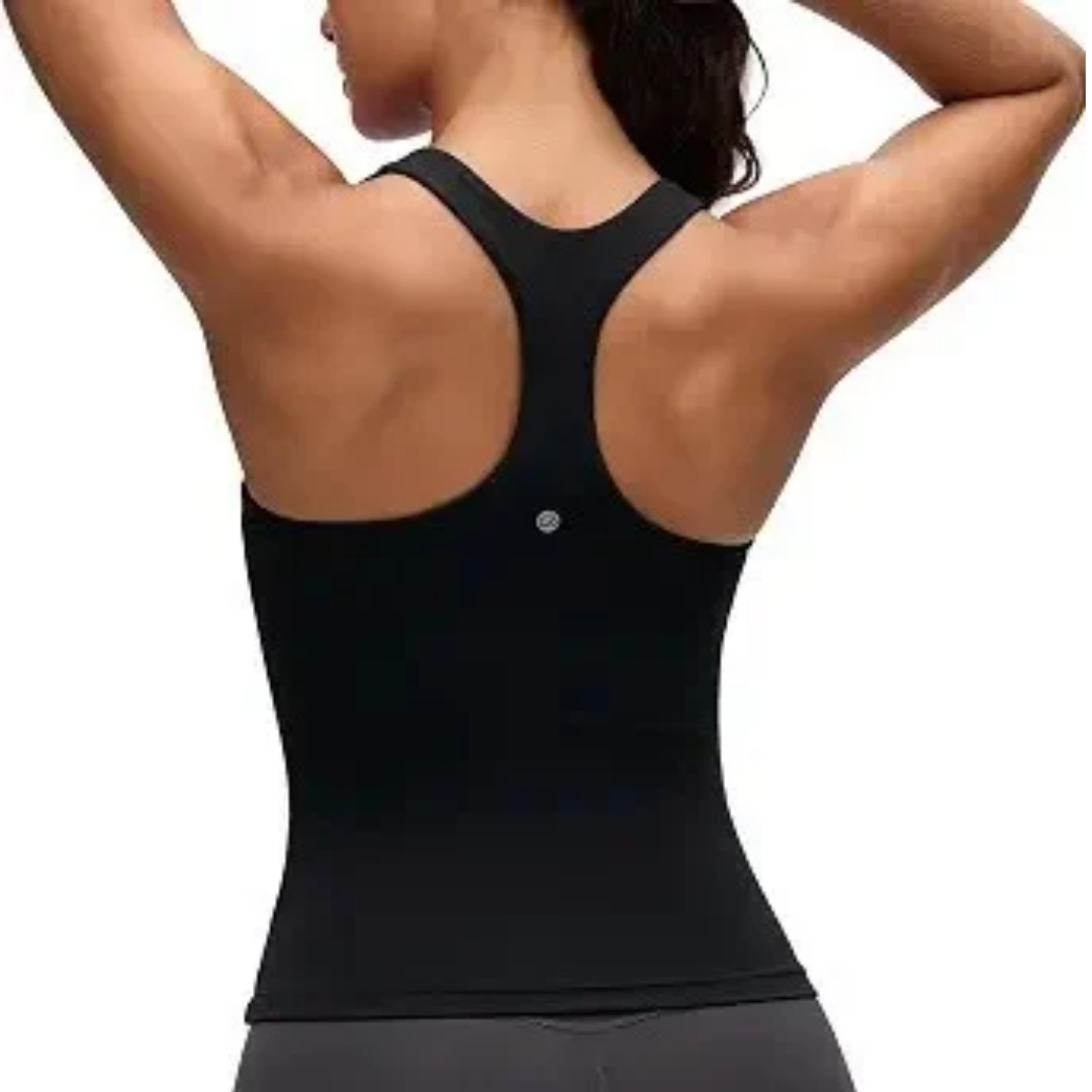 Back view of a woman wearing a fitted black racerback athletic tank top with her arms raised against a white background.
