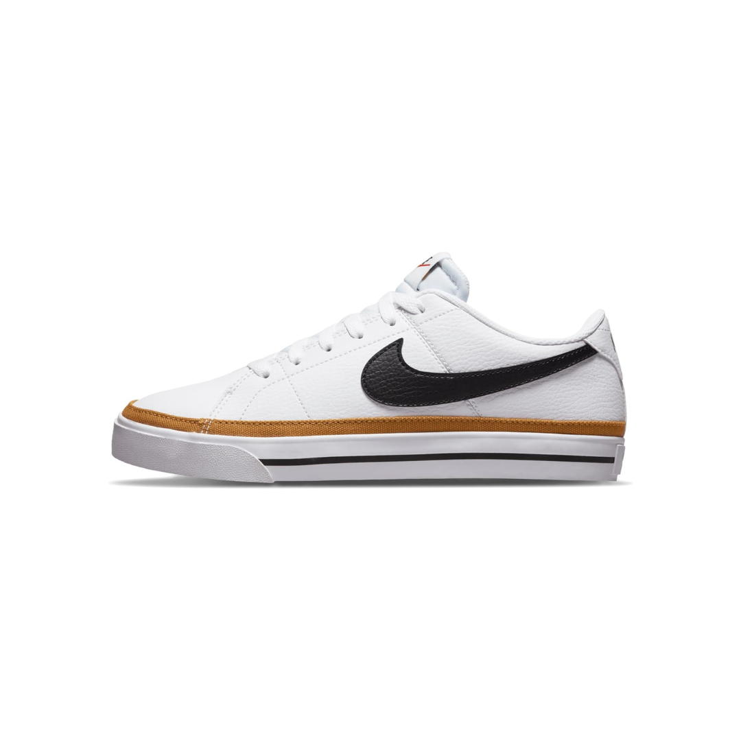 White Nike Women’s Court Legacy Next Nature sneaker with black swoosh detail and gum-colored sole displayed against a light background.