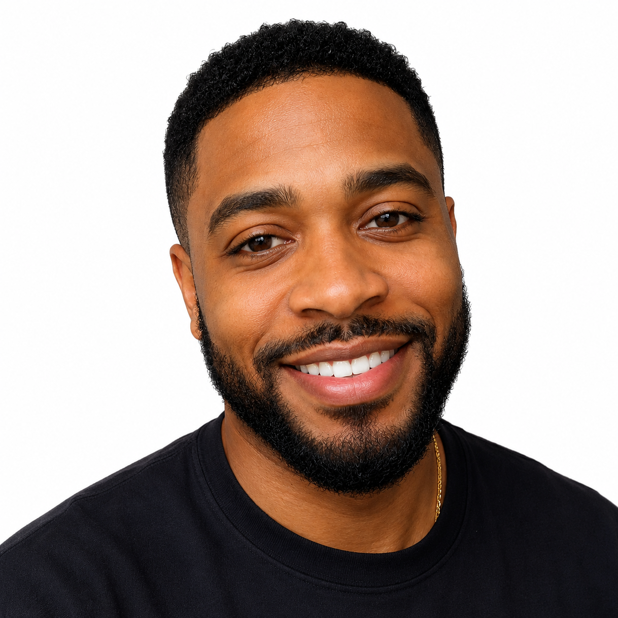 40-something Black man with facial hair and a black t-shirt