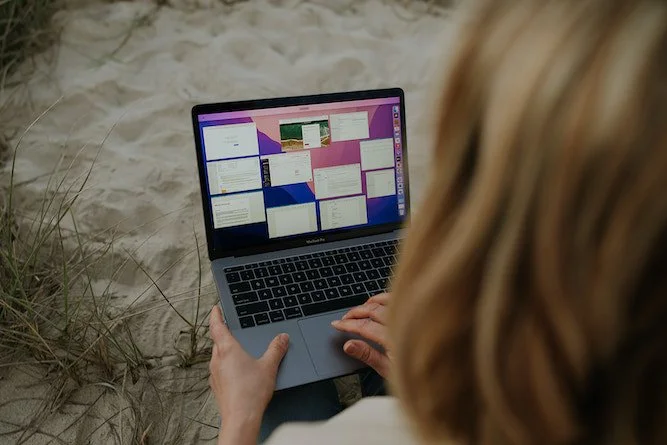 Abby typing on laptop