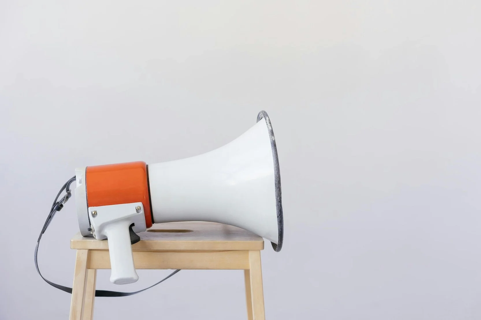 Megaphone on chair representing announcement