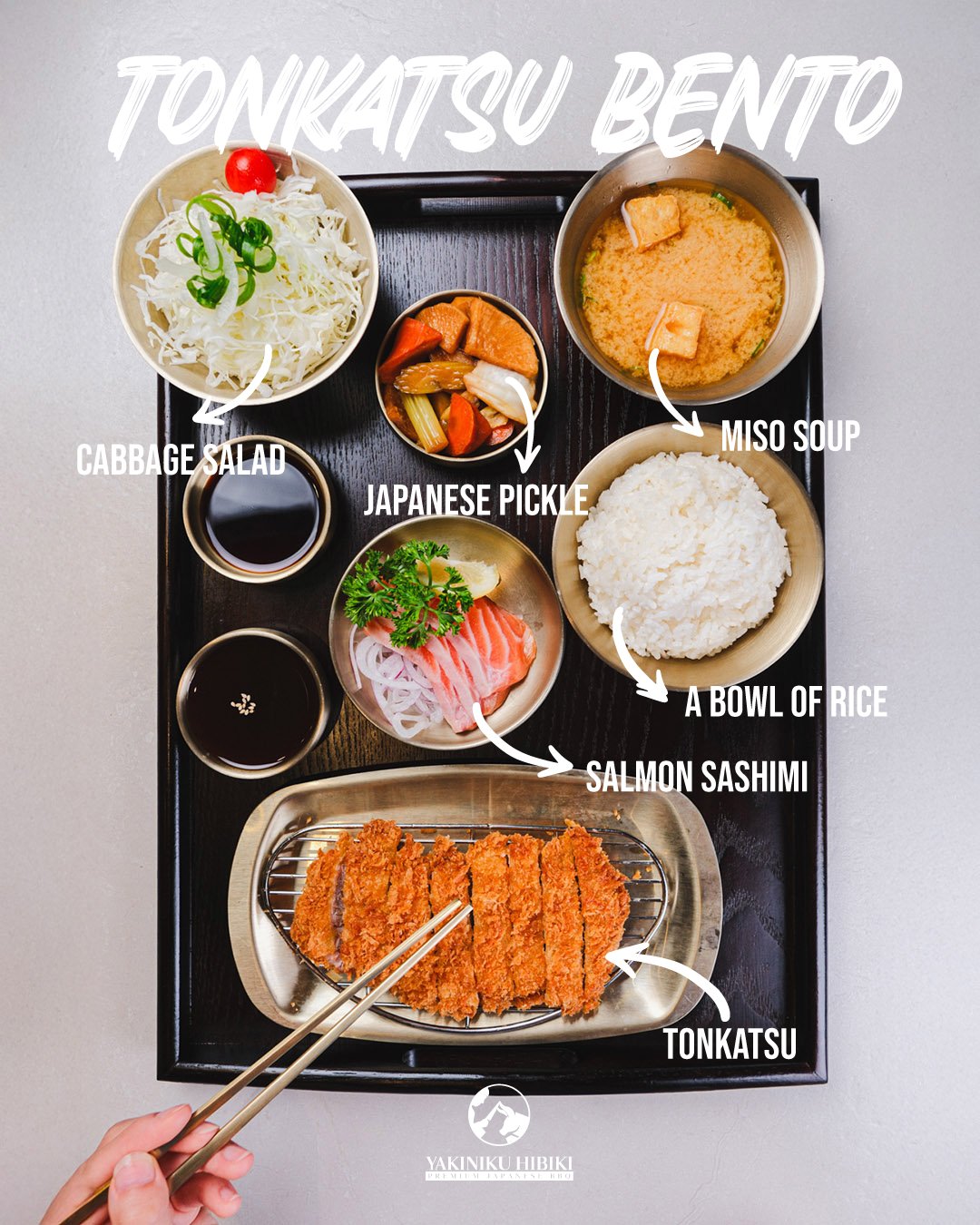 🍱 Tonkatsu Bento &ndash; $28.9

Crispy, golden tonkatsu served as a complete Japanese bento experience.

Enjoy a well-balanced set including:
&bull; Fresh cabbage salad
&bull; Japanese pickles
&bull; Salmon sashimi
&bull; Miso soup
&bull; A bowl of 