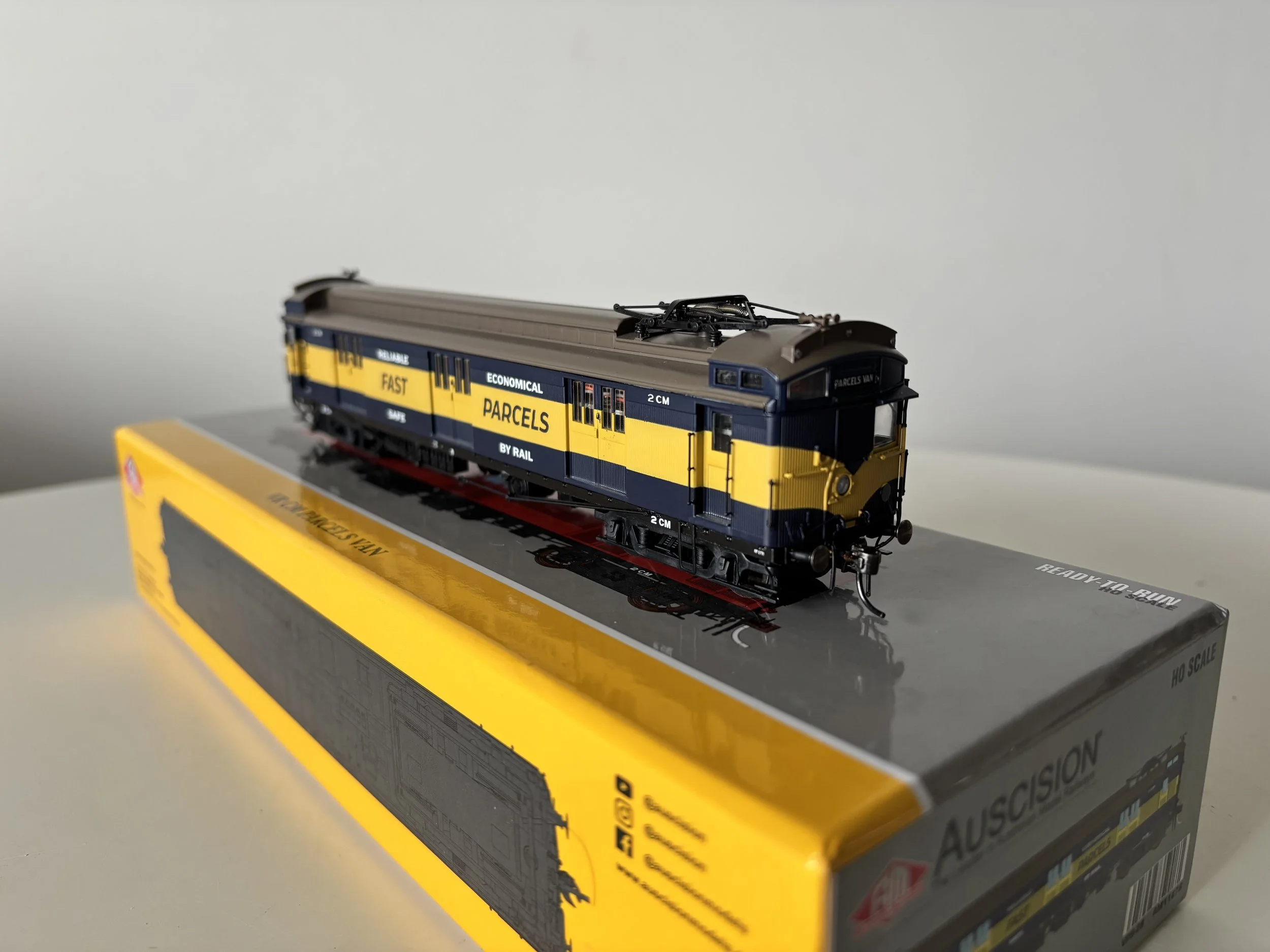 Auscision Victorian Railways CM Parcel Van - Blue and Gold