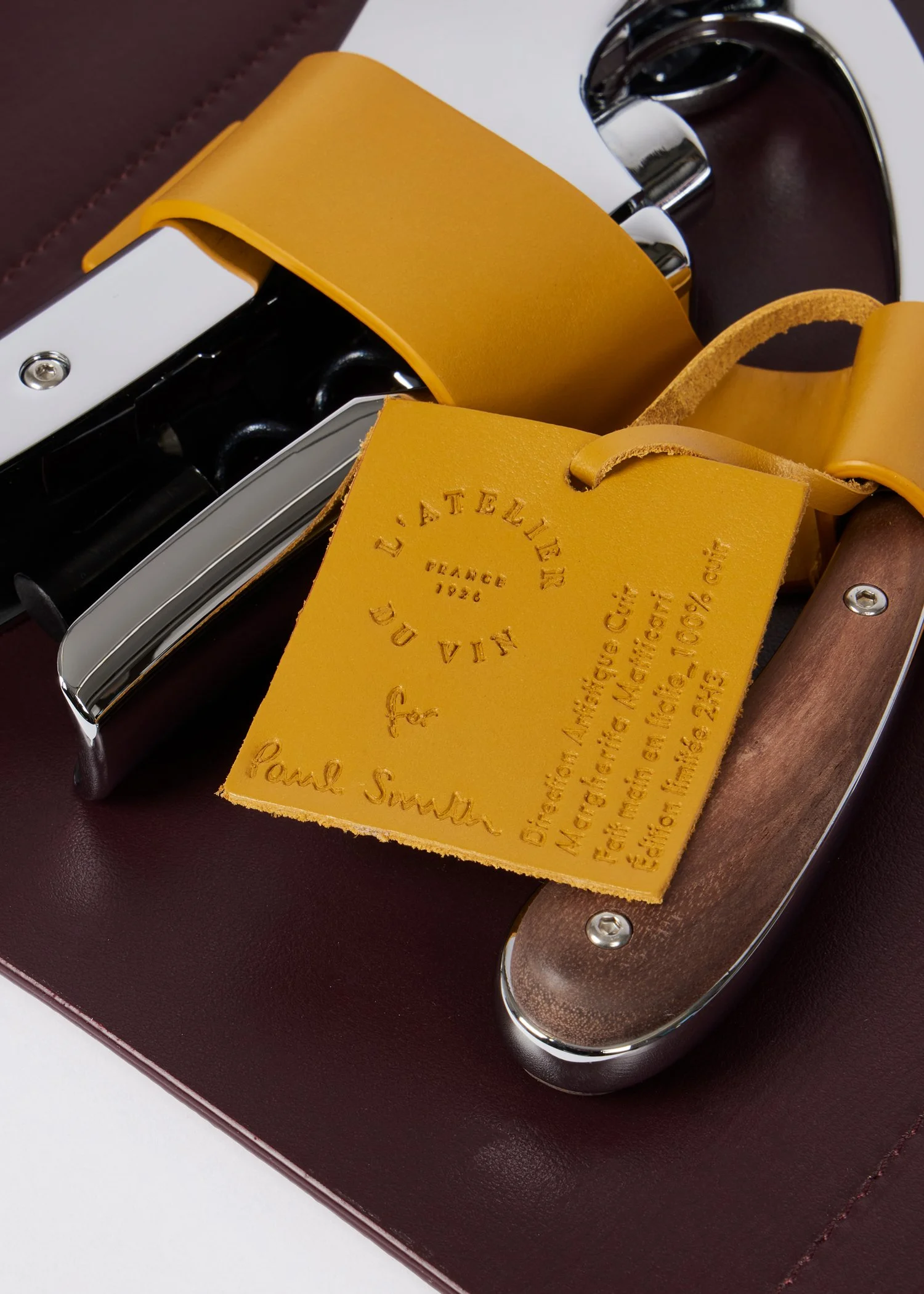 L'Atelier du Vin Paul Smith corkscrew leather carry case mustard leather tag
