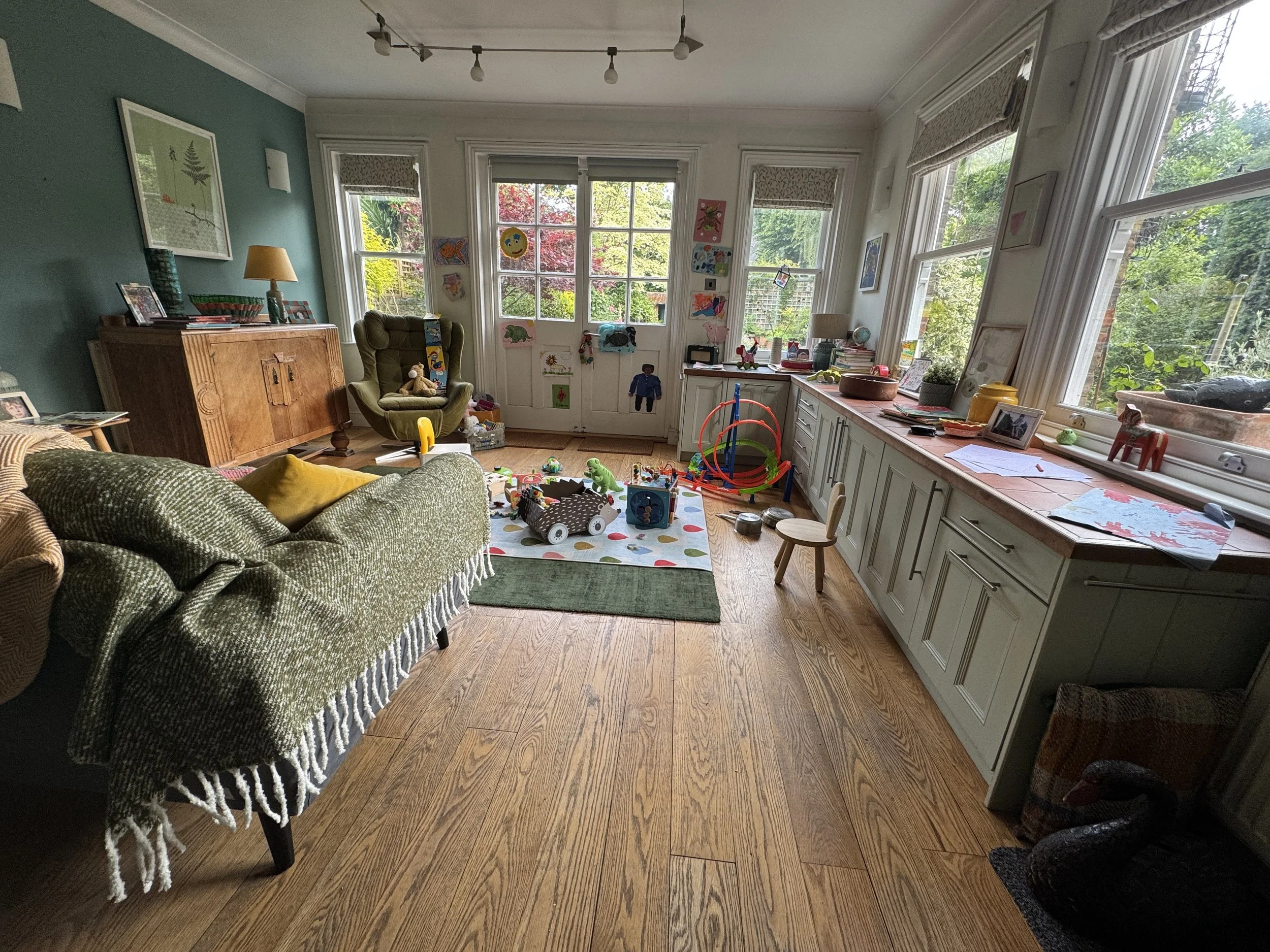 Transformed this kitchen dining area to a family room child's play area