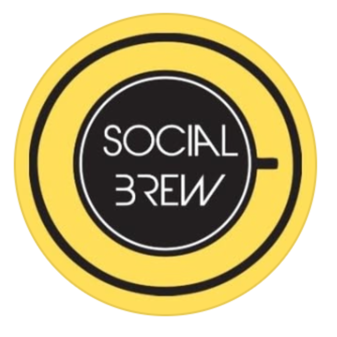 A round yellow and black social distancing sticker with the words "SOCIAL DISTANCE" in the center.