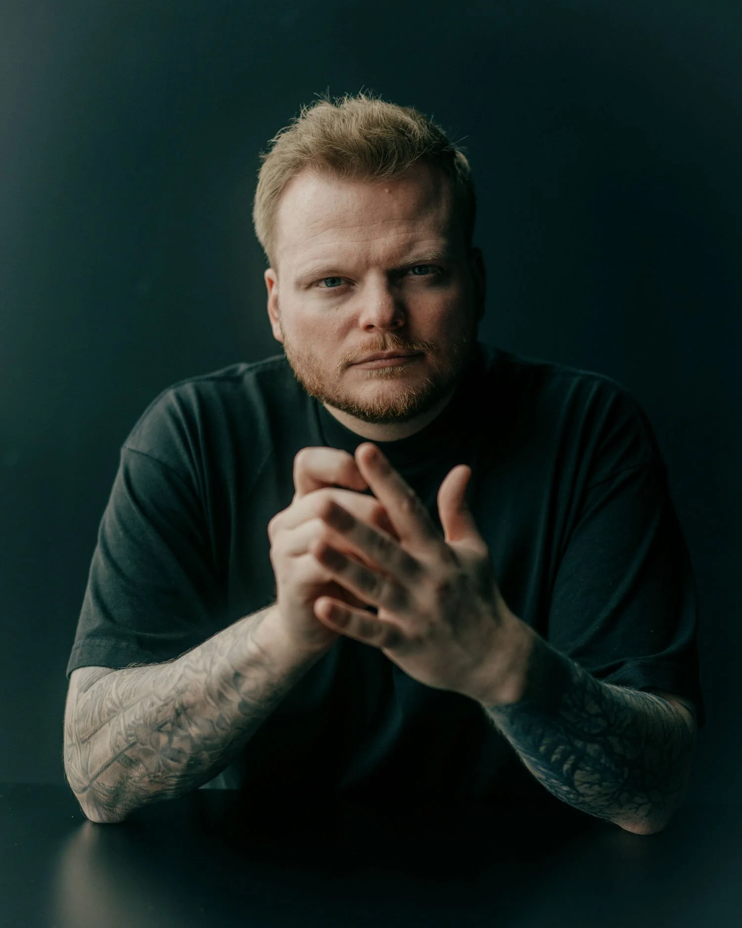 Chef Rassmus Munk portrait inside Alchemist restaurant in Copenhagen