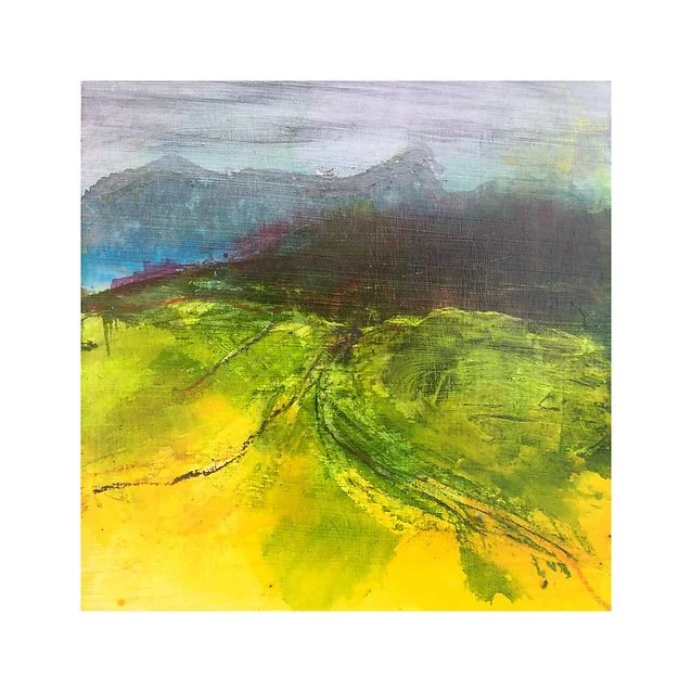 Abstract landscape painting with mountains in blue and purple hues, green rolling hills, and yellow foreground.