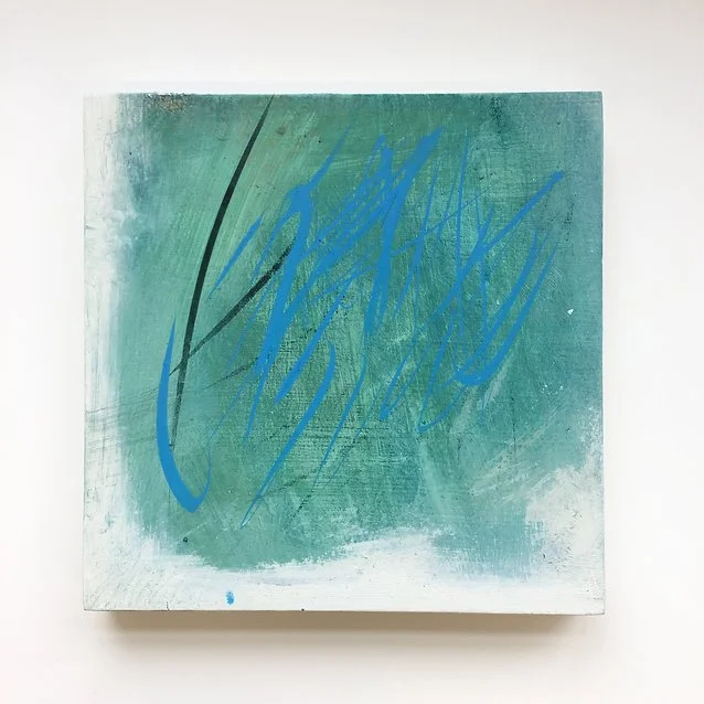 Abstract painting with green background and blue and black scribbles.