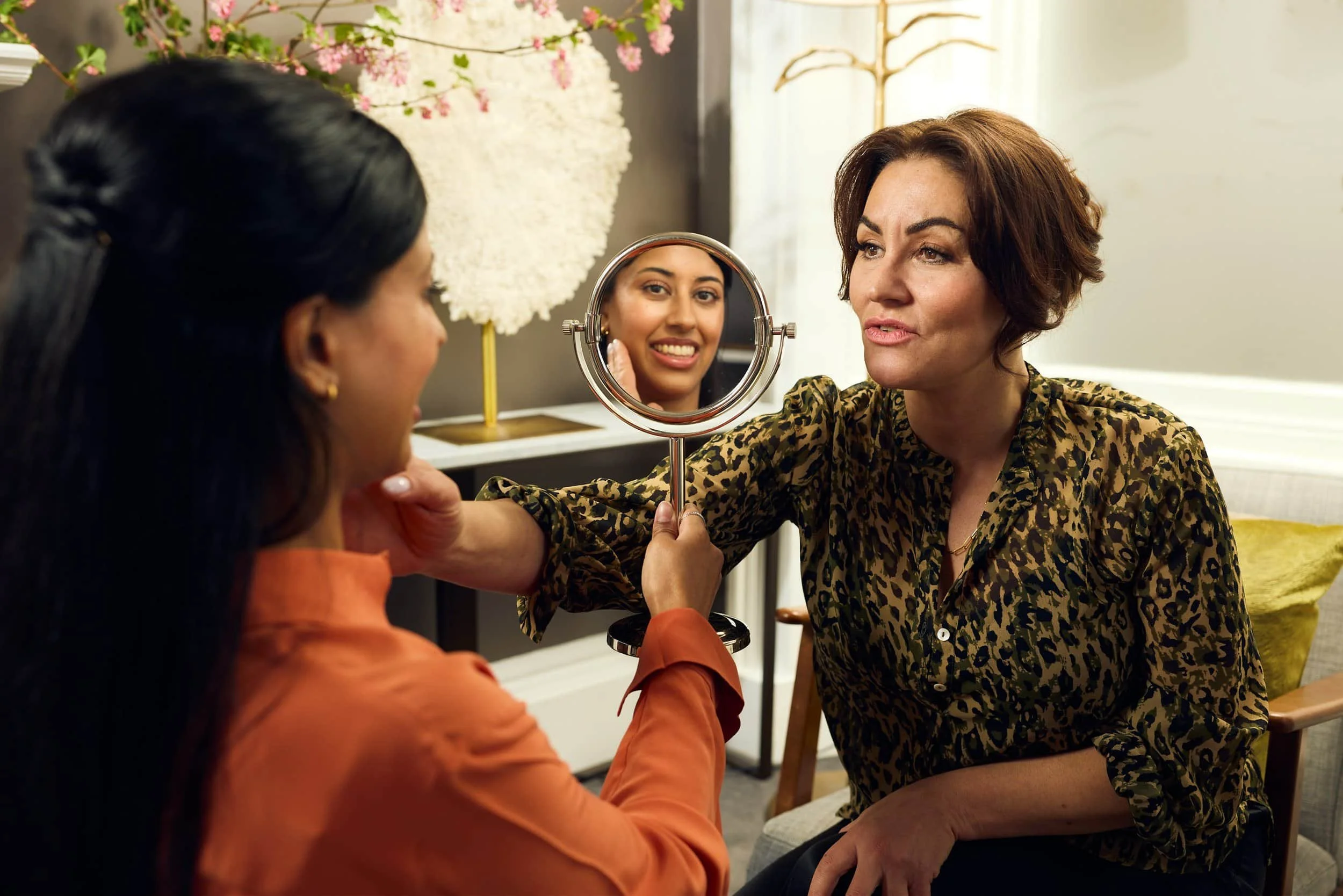 Liz in consultaion with client discussing skincare in your thirties