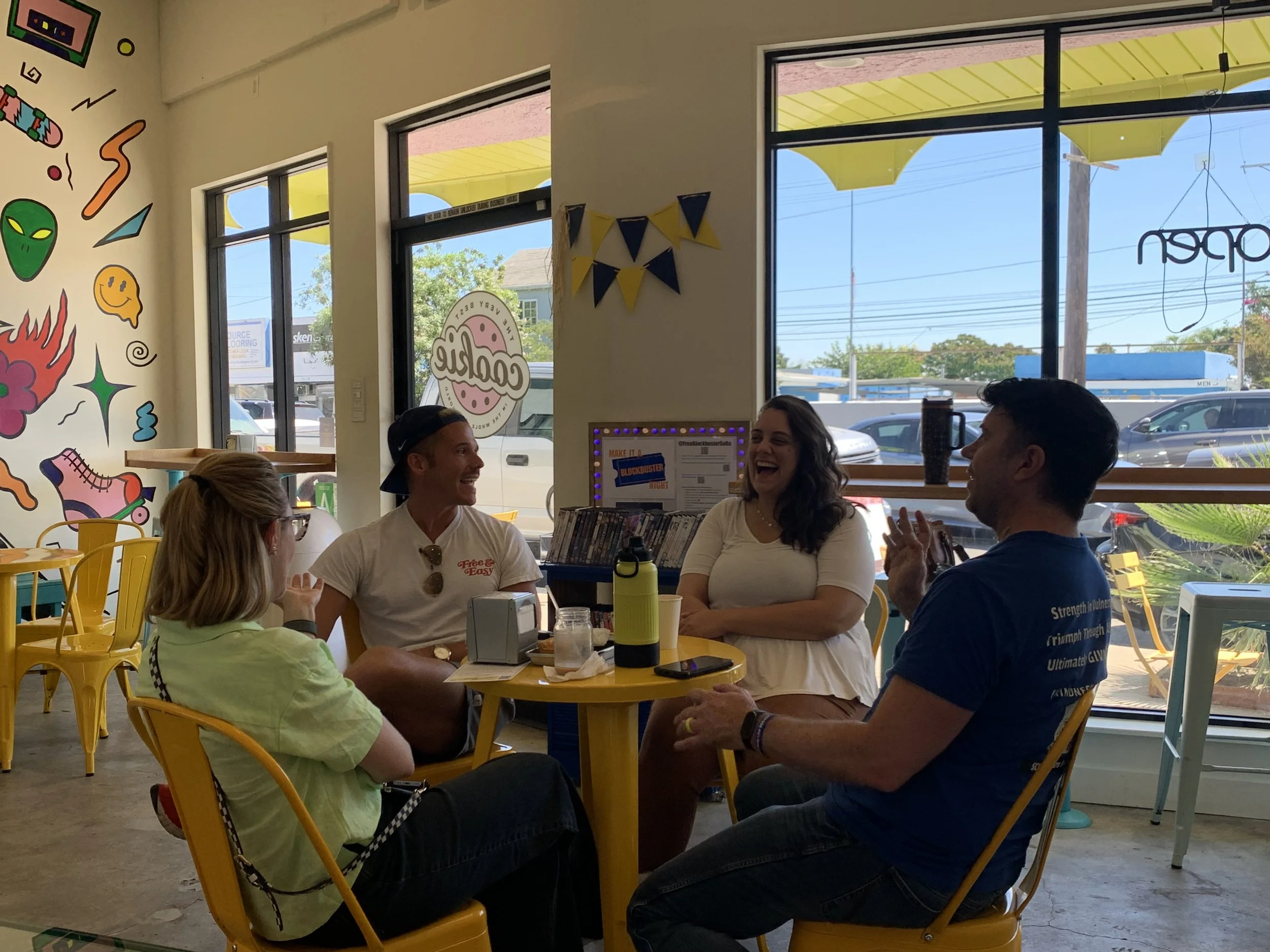 group of people talking in cafe