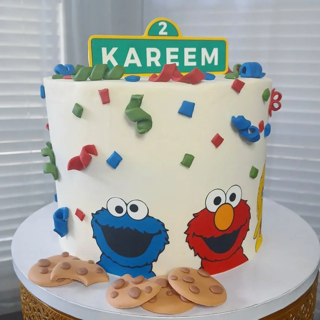 Happy birthday, Kareem!

This Seasame Street inspired cake featured favorite characters Cookie Monster, Elmo, and Big Bird alongside handmade fondant cookies and confetti pieces! 🎊 

The street sign topper and characters are printed edible images, m