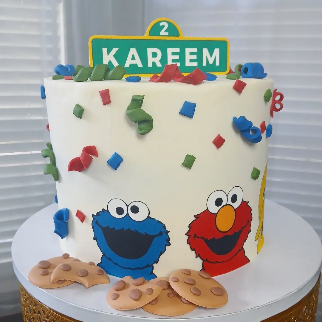 Happy birthday, Kareem!

This Seasame Street inspired cake featured favorite characters Cookie Monster, Elmo, and Big Bird alongside handmade fondant cookies and confetti pieces! 🎊 

The street sign topper and characters are printed edible images, m