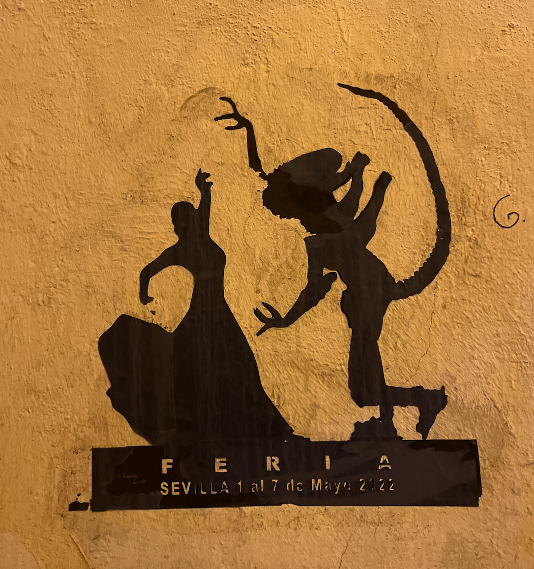 Photo by Kate Bettes of graffiti showing a flamenco dancer dancing with an alien
