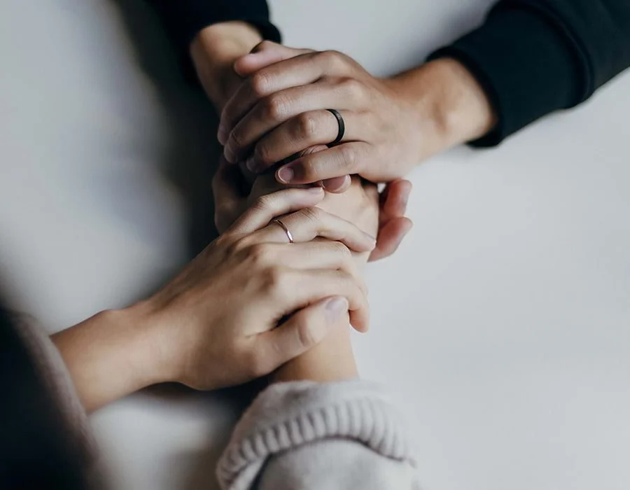 multiple hands connecting