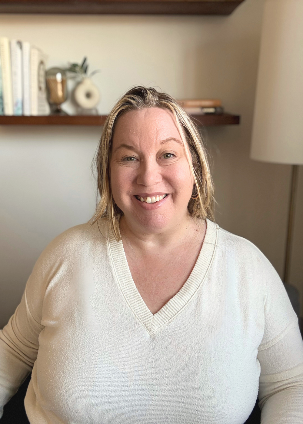 Dr. Heather Stevenson, psychologist in New York City, smiling warmly in her office.