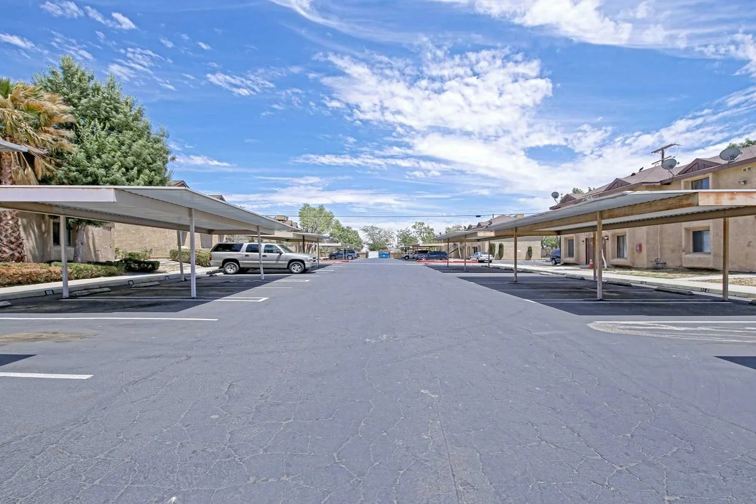 This image shows the parking lot with awnings to cover the cars.