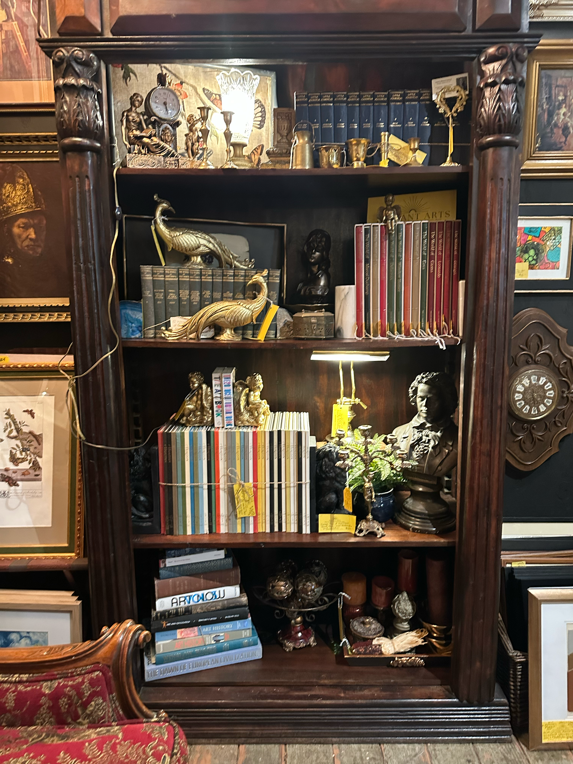 Dark Academia full of Art History inside Antique Bookcase