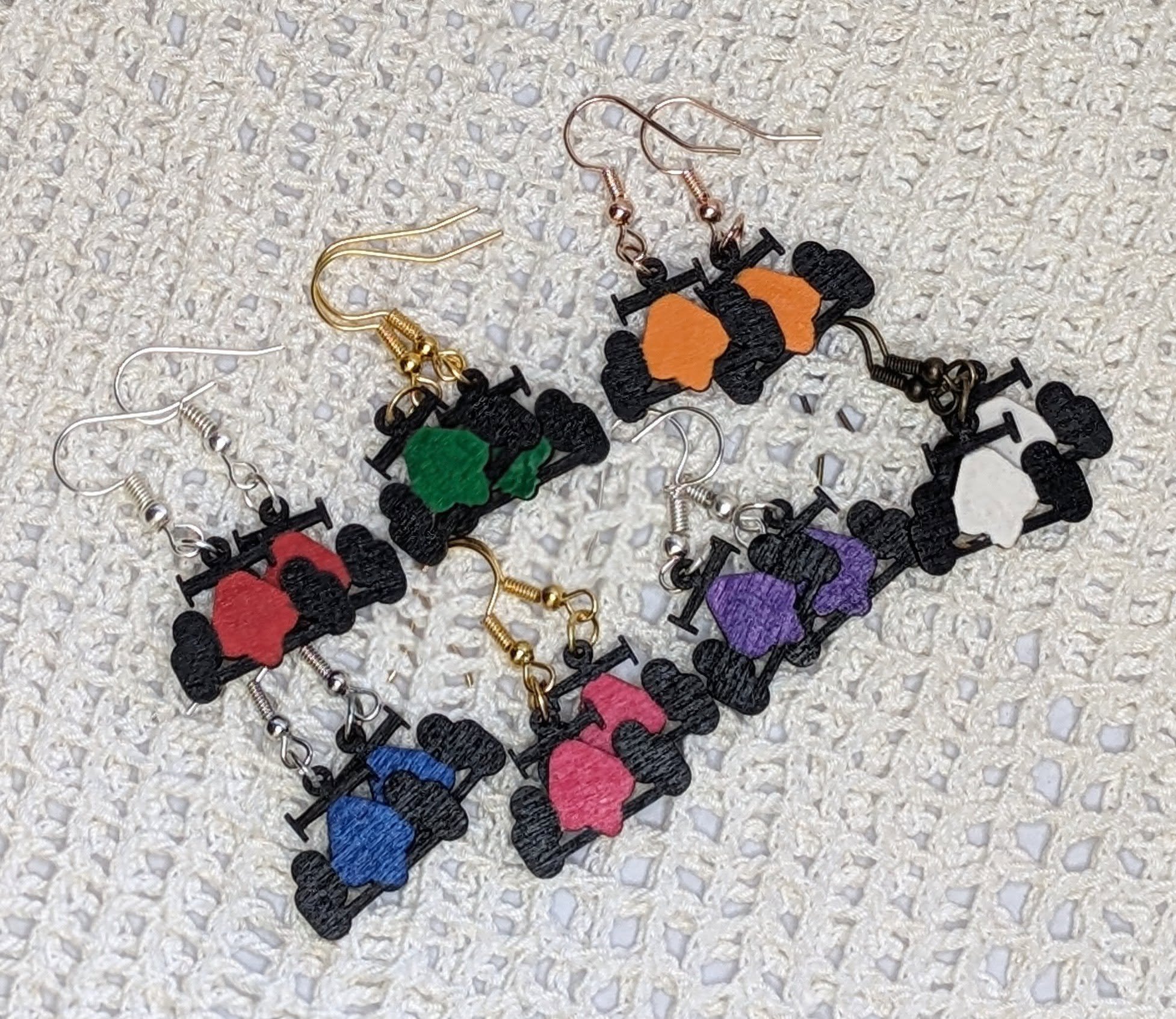 Ever been to Indy in May? It's a month like no other and one of our favorite times. While it's not May, racing season is far from over! Spend your weekends at the track (like we do!) in style with our hand-painted racing earrings! These were designed