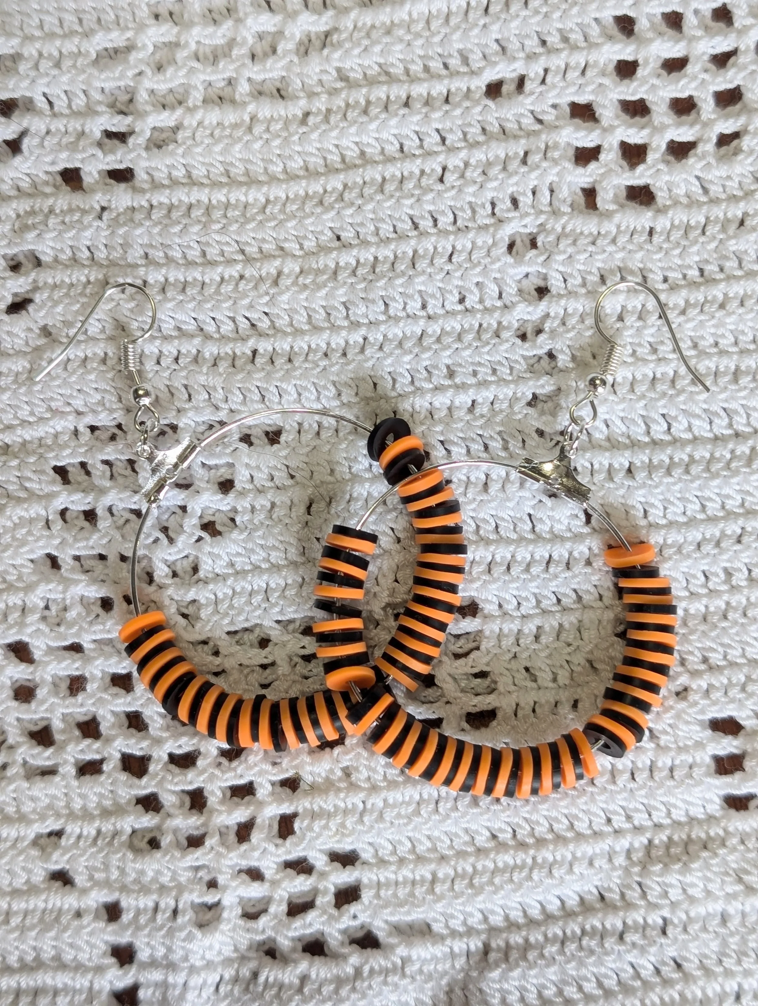 Halloween orange black earrings.jpg