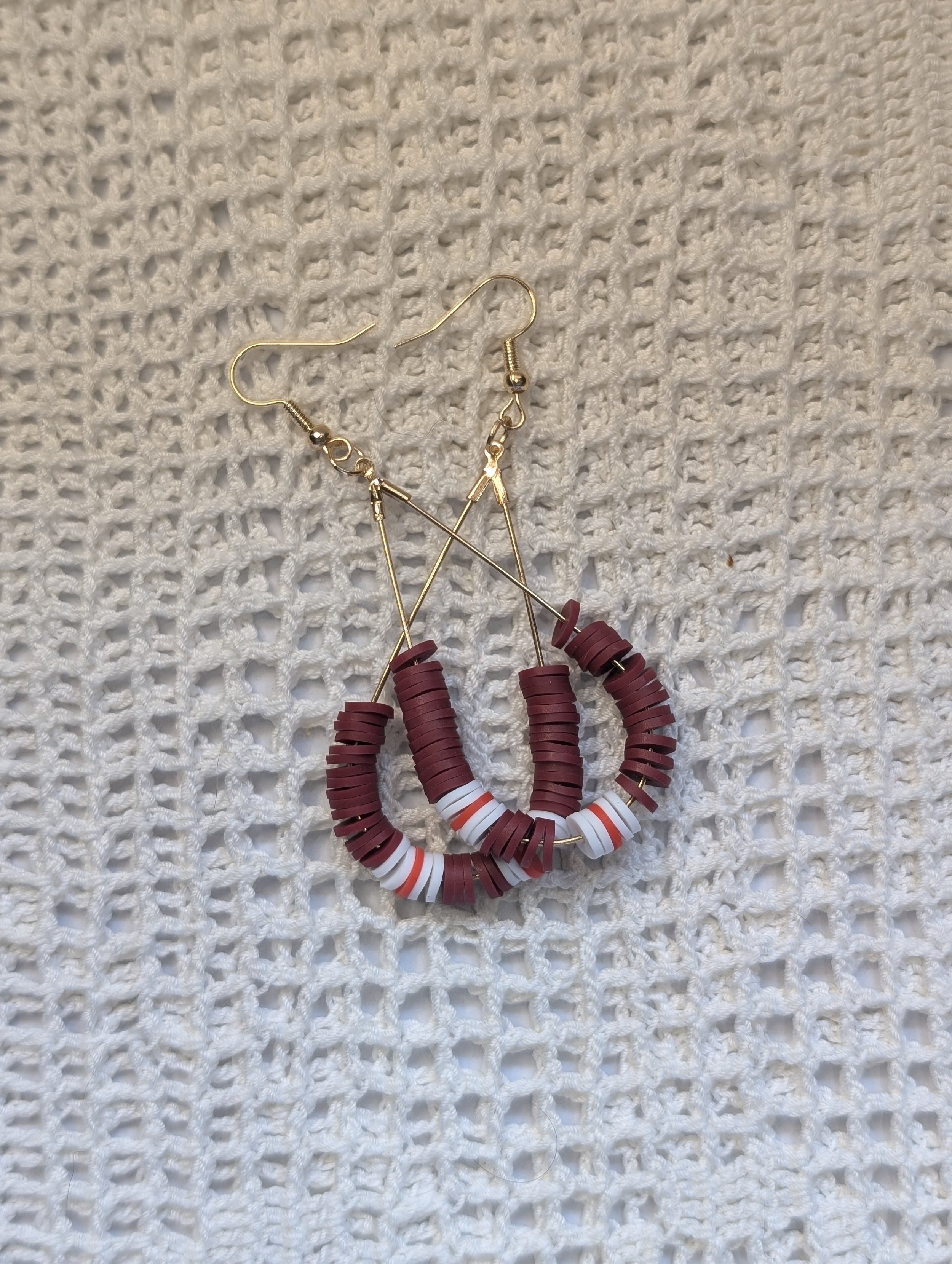 Mustard Seed by Carlisle Red Earrings Laying.jpg