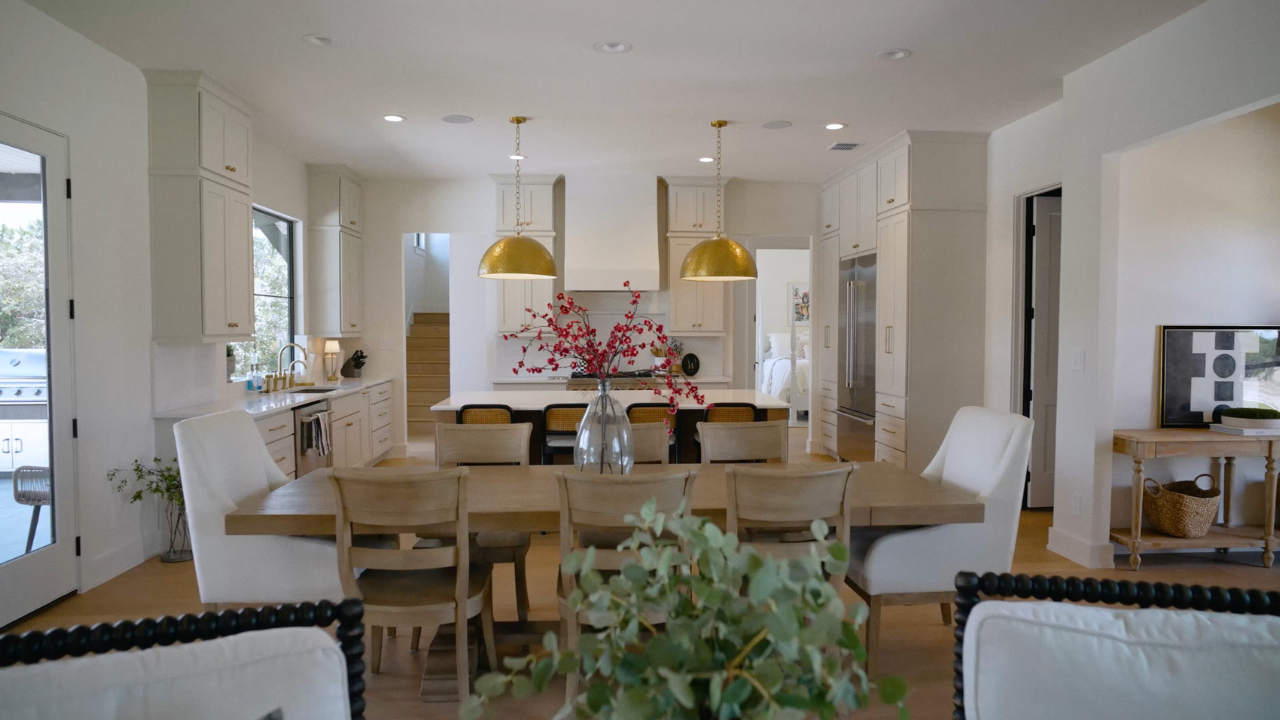 Dining room open to the kitchen from our custom home gallery, with Texas Living Homes in Fredericksburg, Texas and the Texas Hill Country