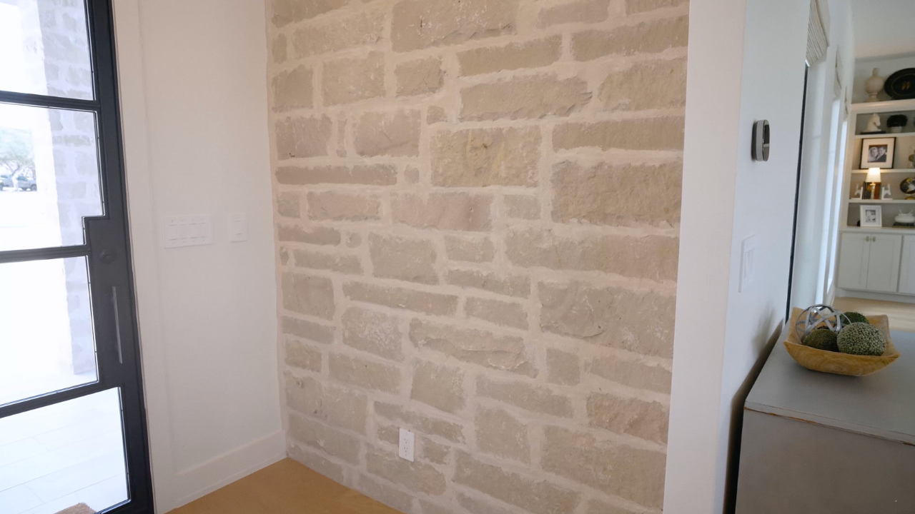 Natural stone accent wall in a Texas Hill Country house, with Texas Living Homes in Fredericksburg, Texas and the Texas Hill Country