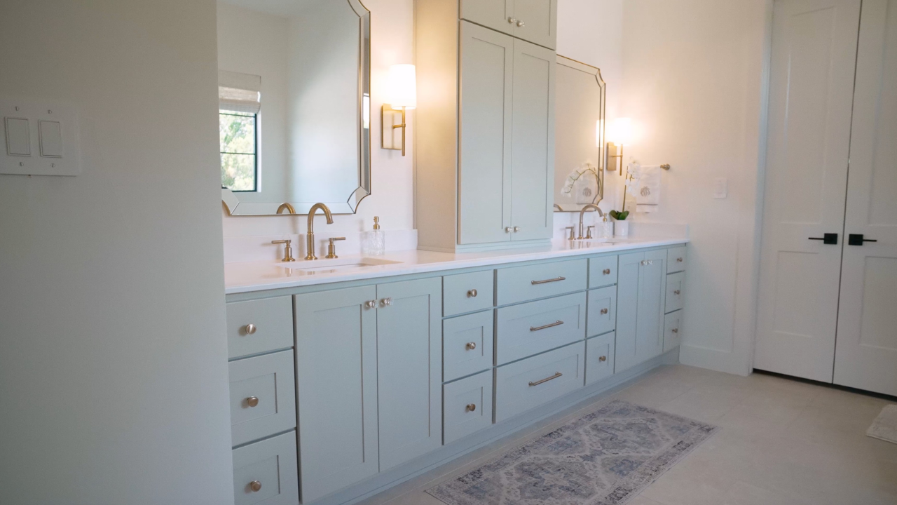Double vanity with custom cabinetry by a custom home builder, Hill Country, with Texas Living Homes in Fredericksburg, Texas and the Texas Hill Country