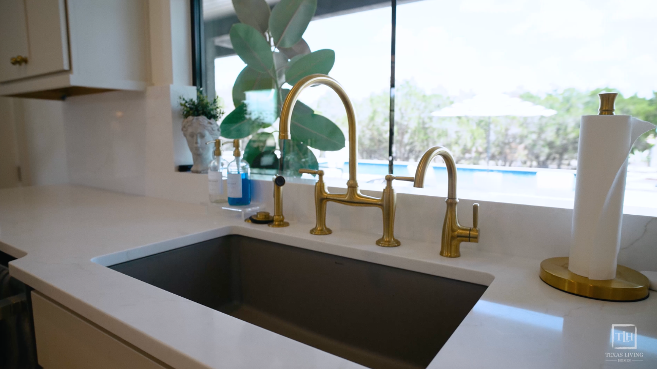 Brass prep sink faucet by custom home builders Fredericksburg TX, with Texas Living Homes in Fredericksburg, Texas and the Texas Hill Country