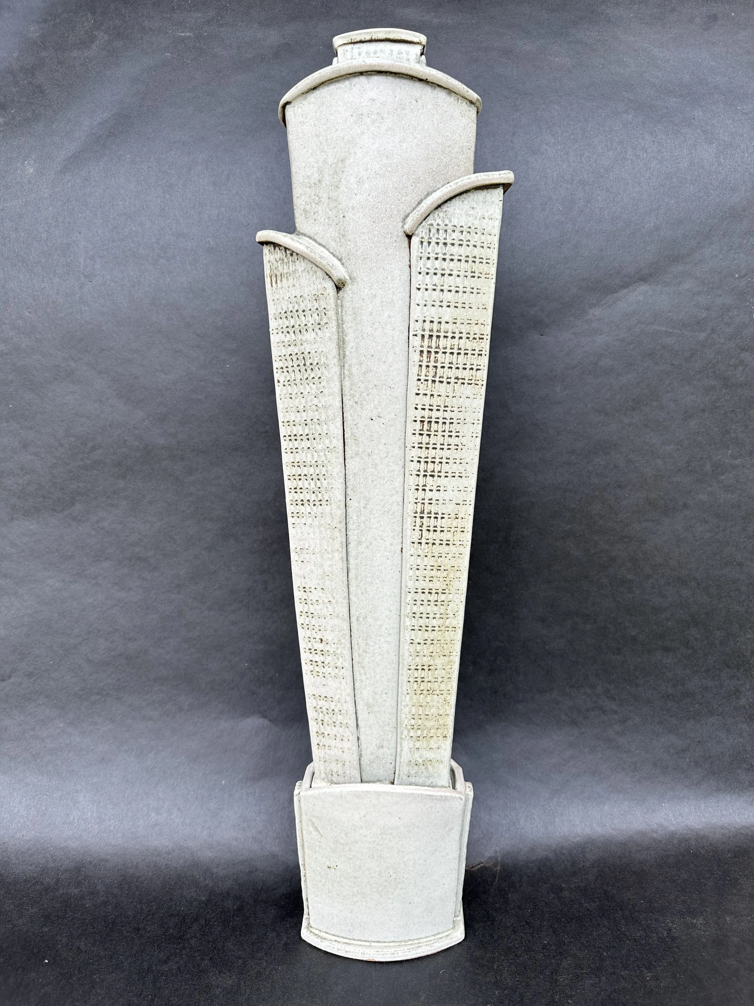 Ceramic sculpture of art deco-style building by ceramic artist, Bebe Alexander