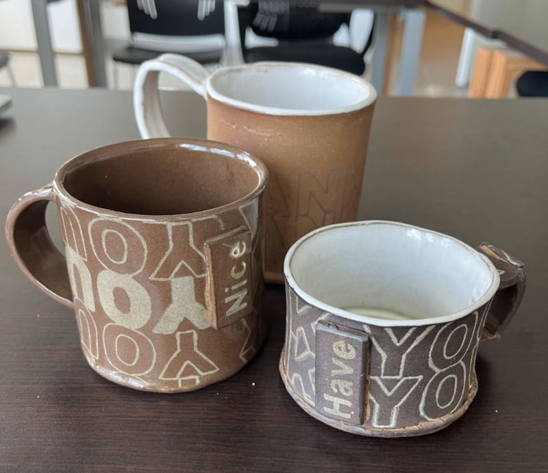 Hand-built mugs with custom underglaze designs printed on them. Printing on Clay is a class offered by Groundworks Art Lab in Boulder, CO.