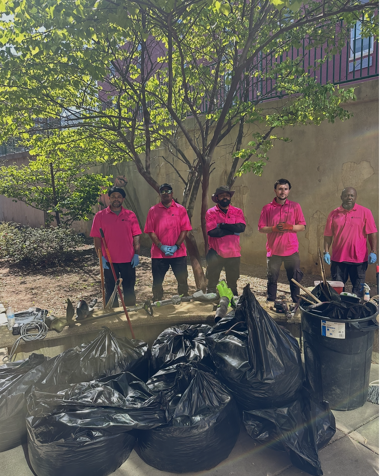 ADID Ambassadors Clean Up Pack Memorial Library Courtyard for Earth Day 