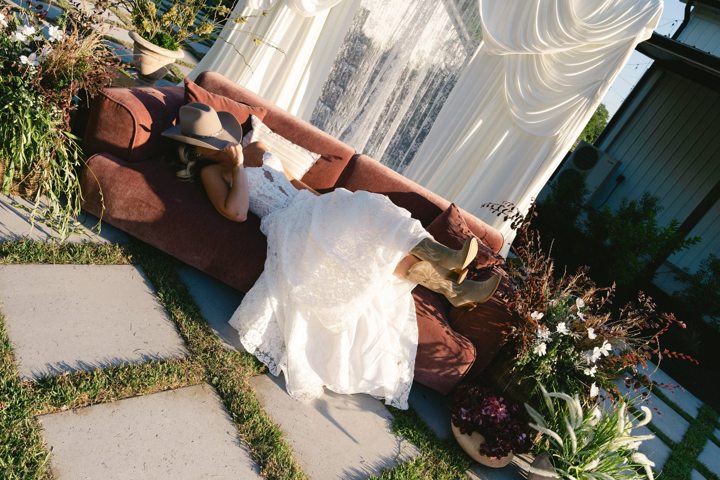Cowboy chic wedding on couch at Suenos by Casa JK