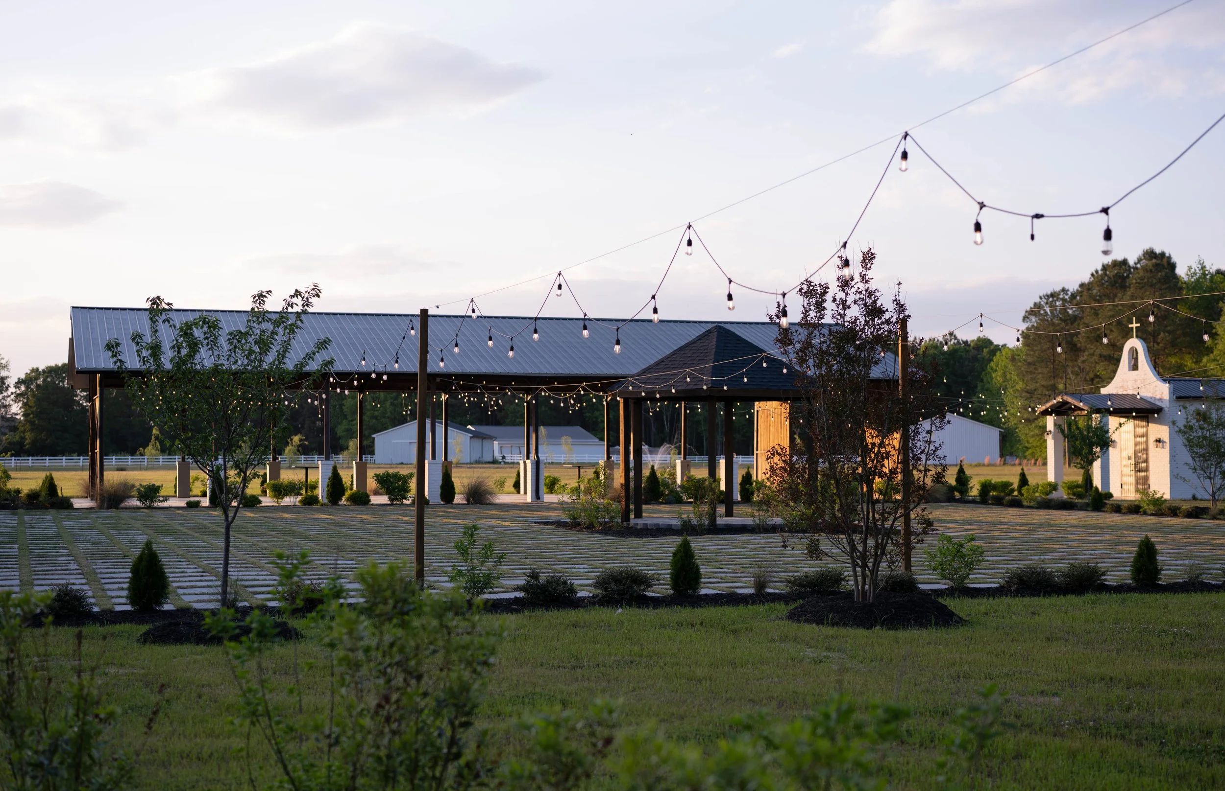 Outdoor ceremony and cocktail hour spaces at Sueños by Casa JK, a wedding venue near Raleigh NC