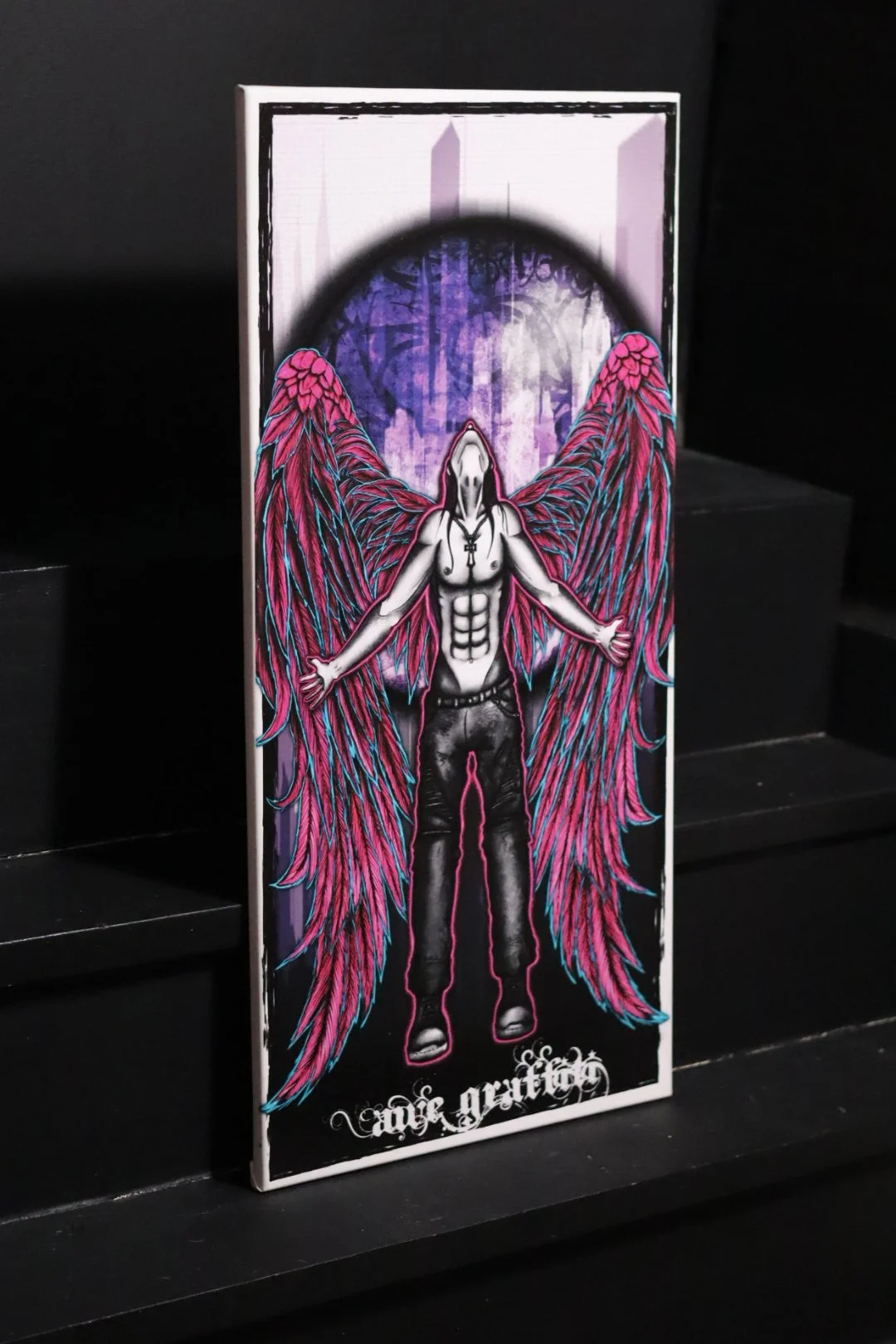 Graffiti style original art canvas featuring a neon and blacklight reactive fallen angel from Oklahoma graffiti artist AWE_Graffiti