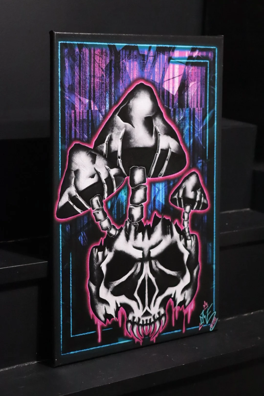Graffiti street art inspired fine art original canvas featuring a blacklight reactive skull and bone mushrooms from Oklahoma native and Edmond artist AWE_Graffiti