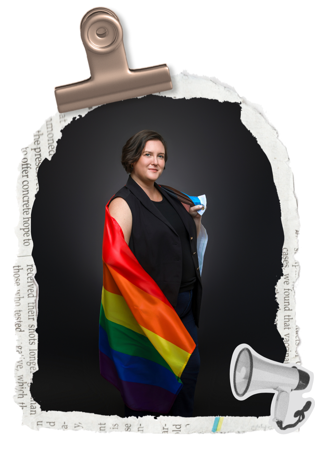 A woman with short brown hair stands confidently with a rainbow pride flag draped over her shoulder. She is wearing a black sleeveless vest and has a neutral expression. The background is dark, and the image is framed by torn paper with a clip at the top and a megaphone icon at the bottom right corner.