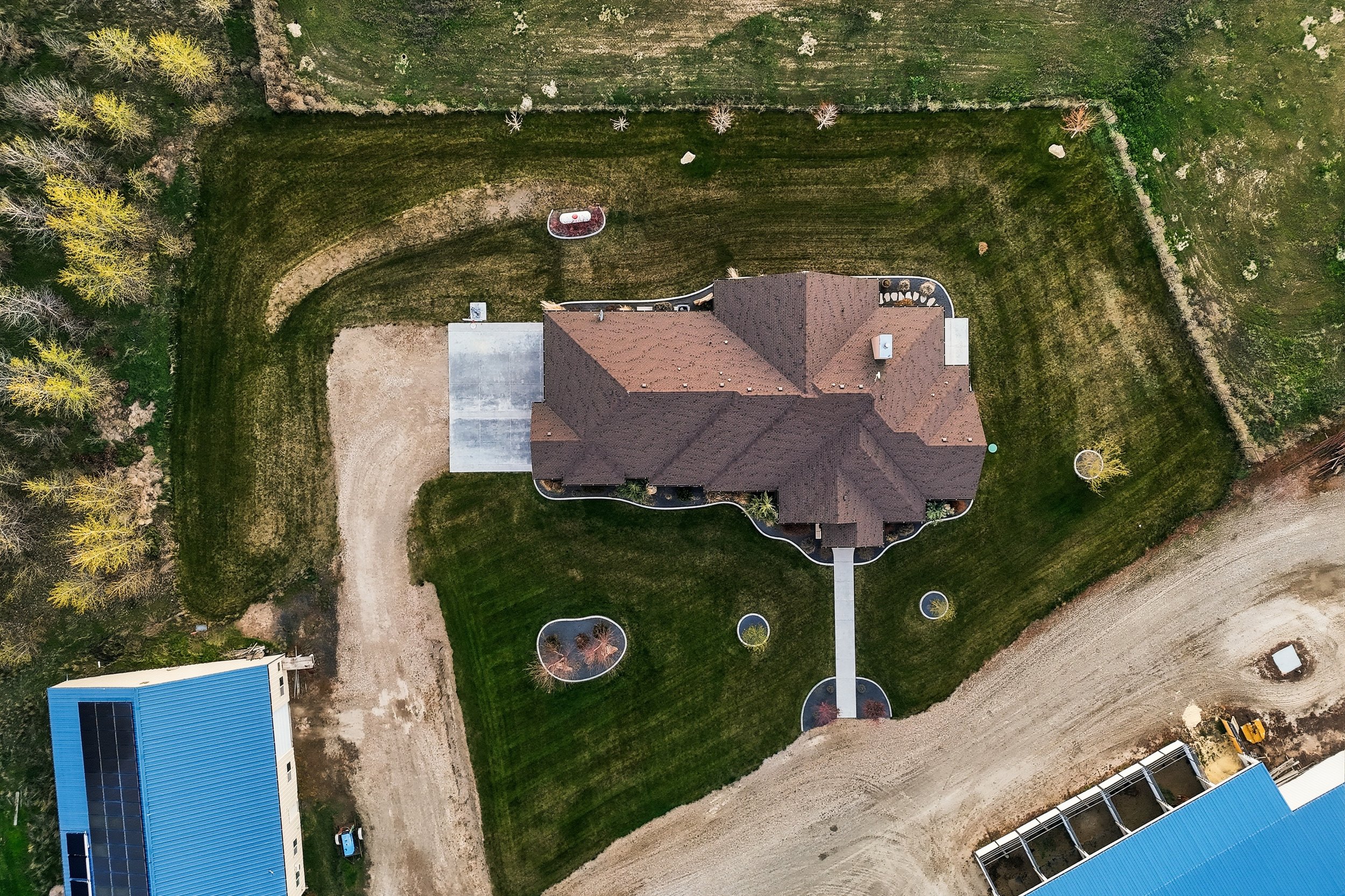 Aerial drone view of a luxury home and lot in Eagle, Idaho