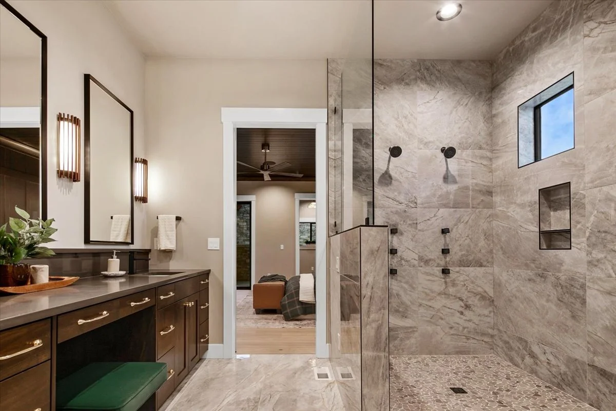 Spa-style primary bathroom with walk-in tile shower at 7017 N Cairnhill Way, Eagle, Idaho