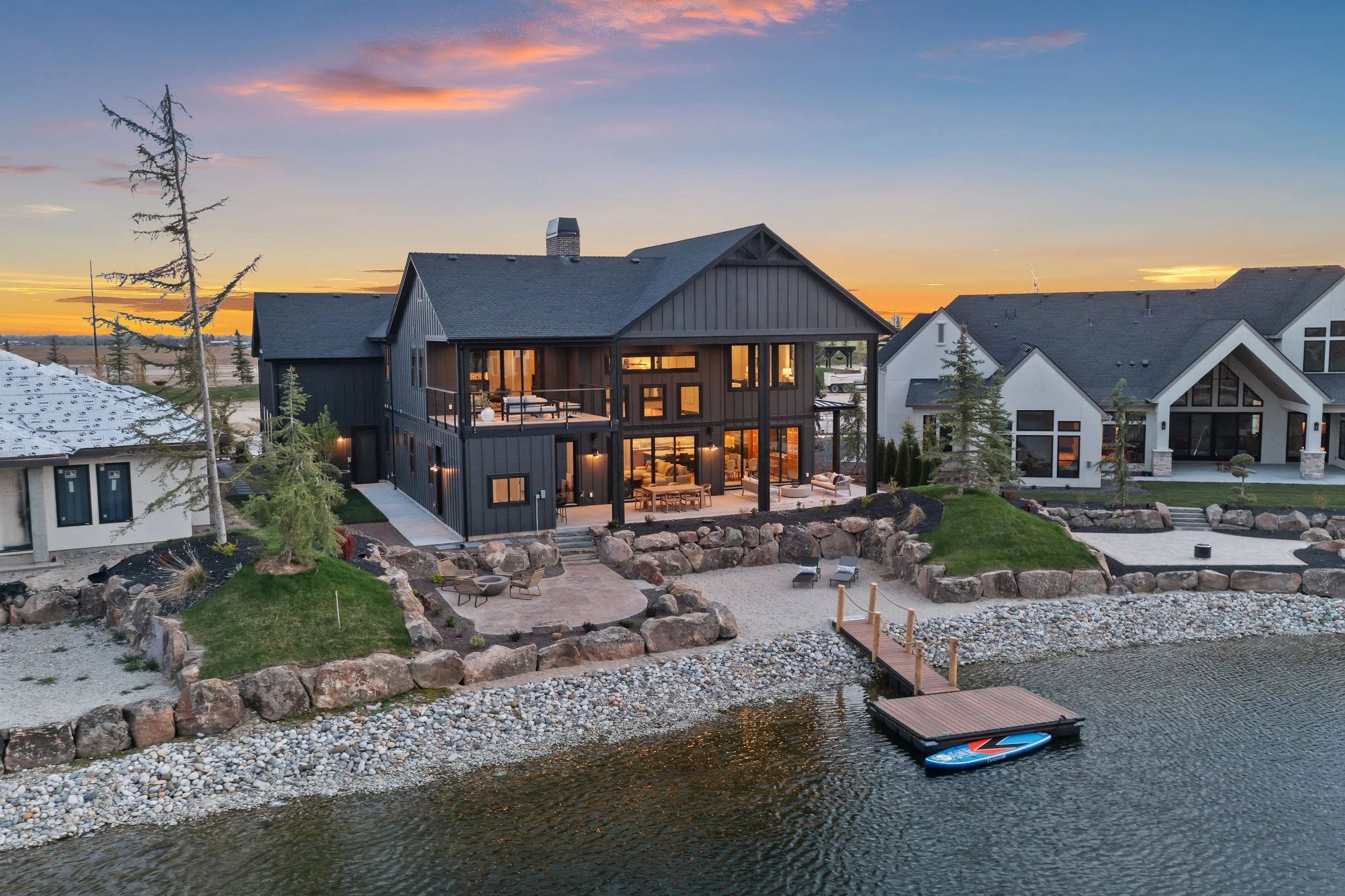 Terra View Lakefront luxury home with private dock at sunset in Eagle, Idaho