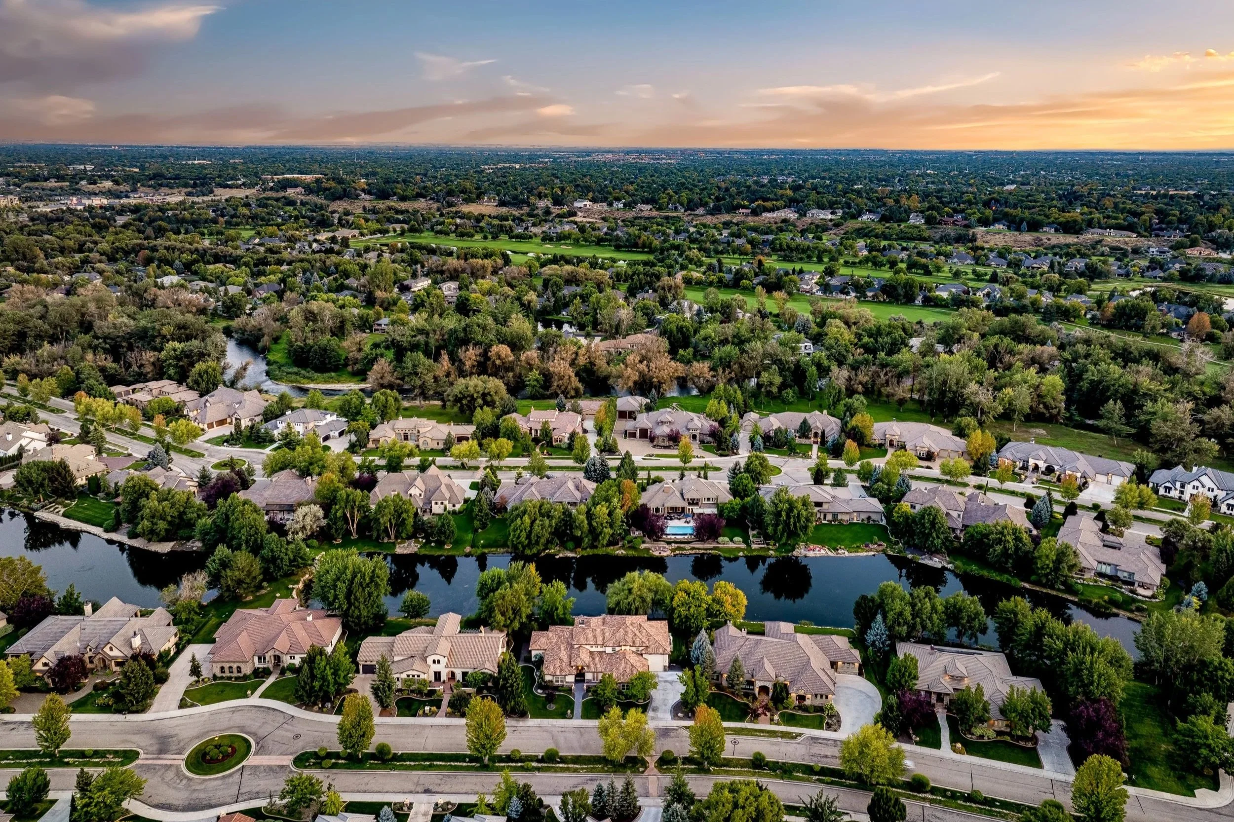 Waterfront luxury homes on one of the ponds in The Shores neighborhood in Eagle, Idaho