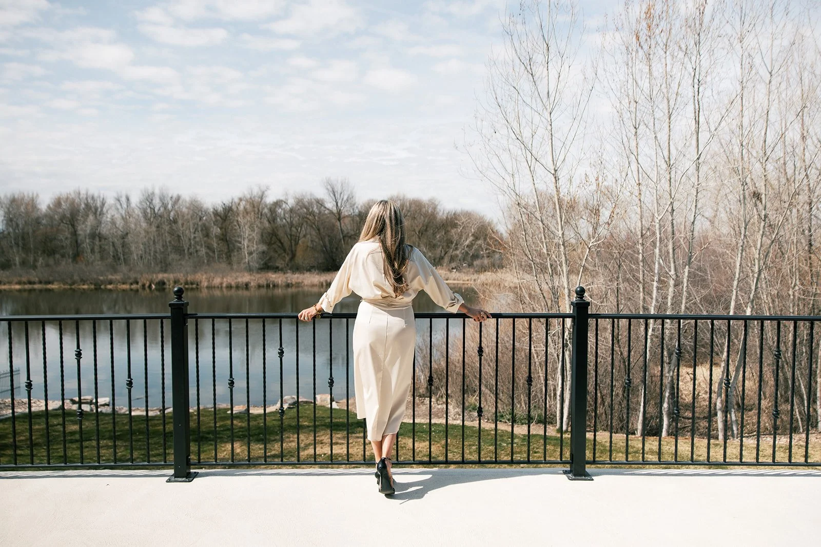 Rachel Postigo, Eagle, Idaho Luxury Realtor, overlooking a community pond in Eagle, Idaho