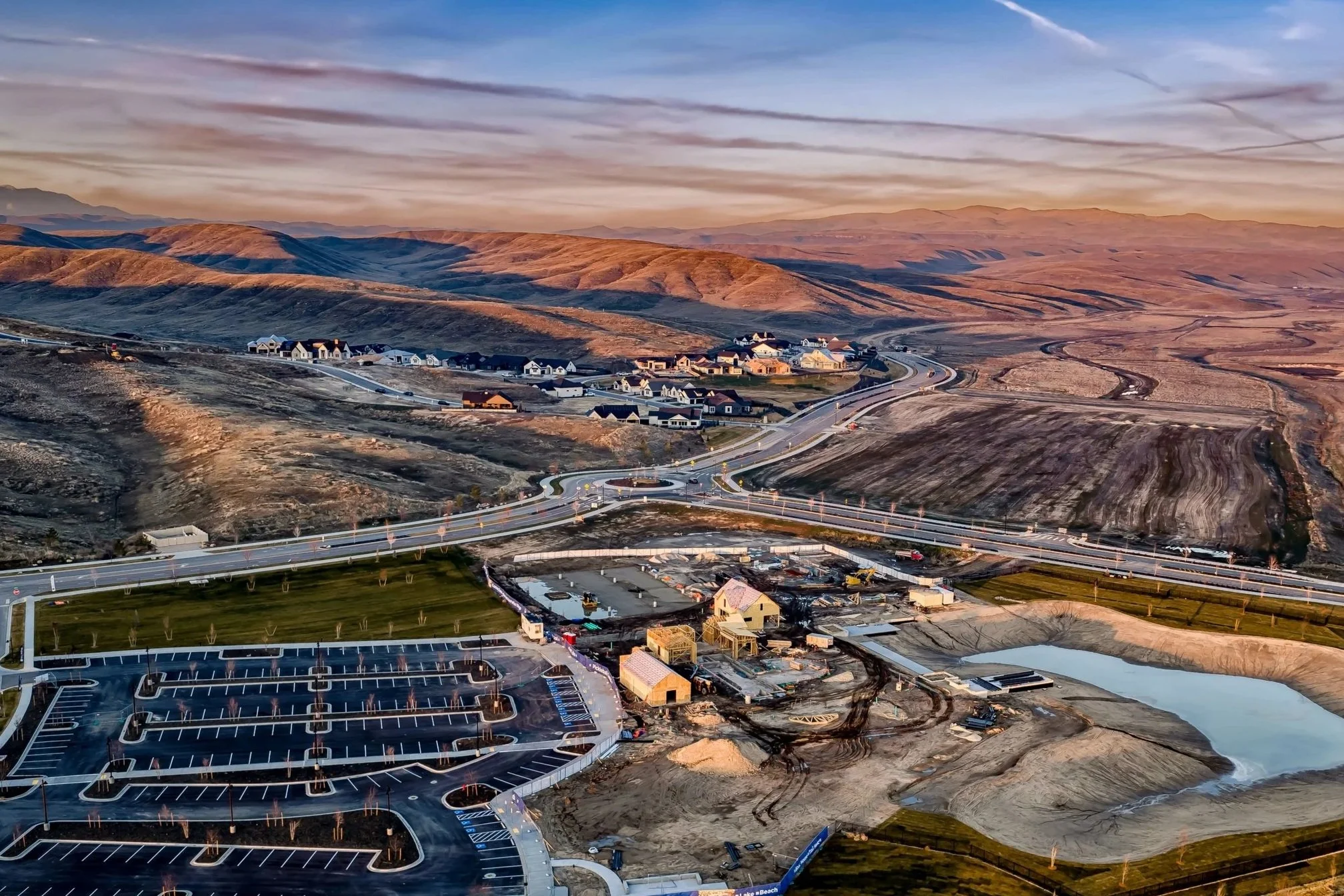 Aerial view of Glencara Recreation Village nearing completion in the Valnova community, with foothills homesites and mountain views, in Eagle, Idaho