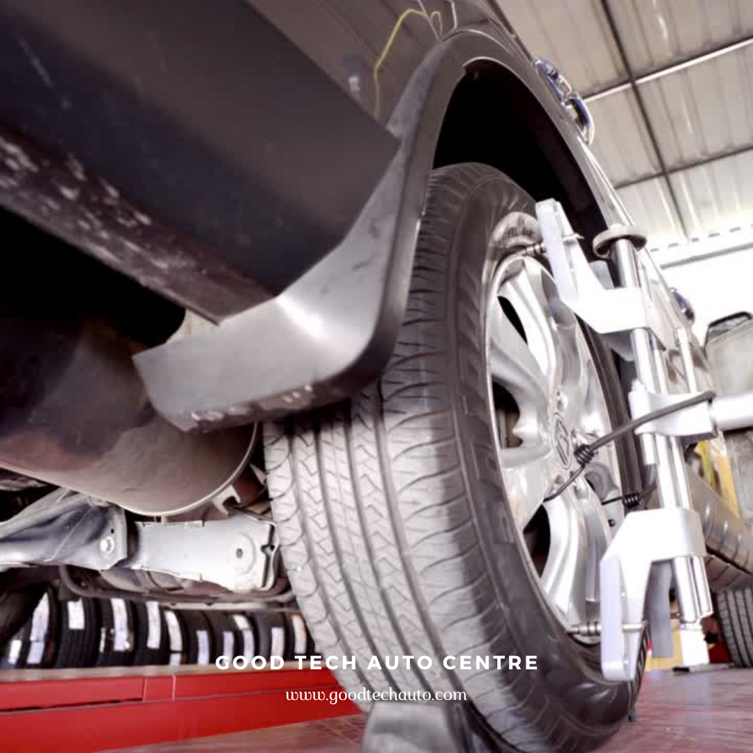 Mechanic Performing Wheel Alignment on Car Using Computer at Good Tech Auto in North York