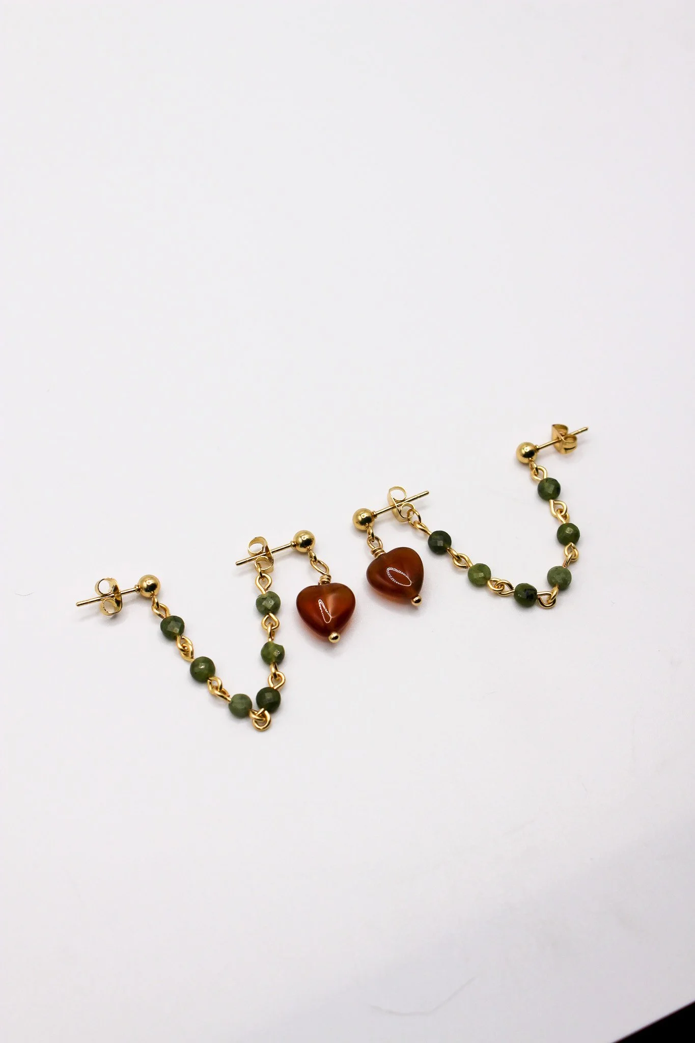 Rust heart with olive green chain